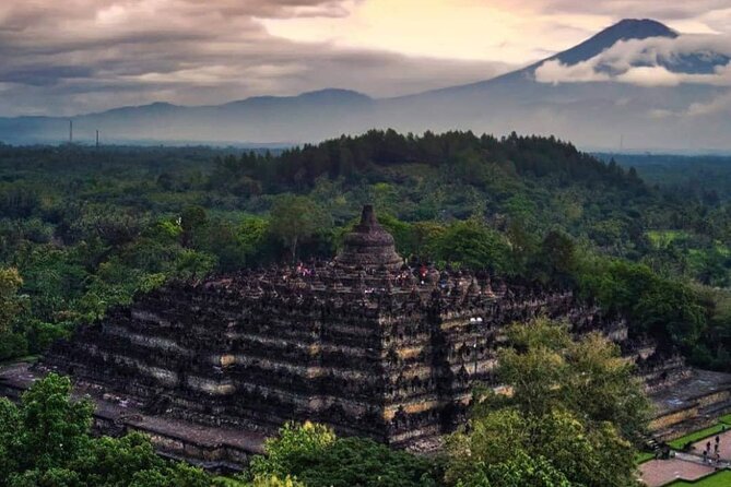 1 day tour borobudur temple,prambanan temple,plaosan temple - Borobudur: nine stacked platforms and the art you can actually read
