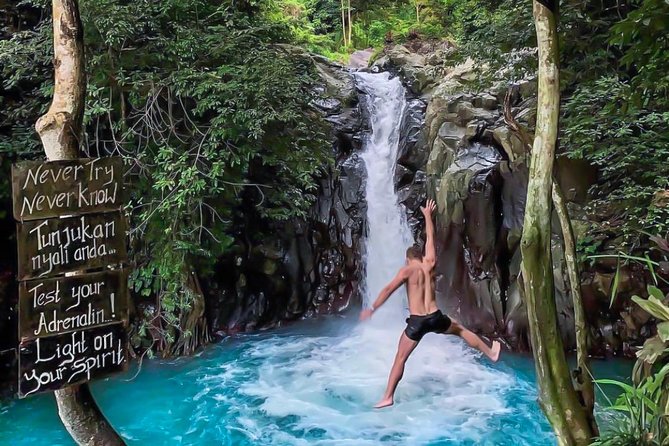 All Inclusive : Jumping Sliding at Aling- Aling Waterfall - Handara Gate - Lunch - Handara Iconic Gate, the 30-minute photo stop that keeps the day balanced