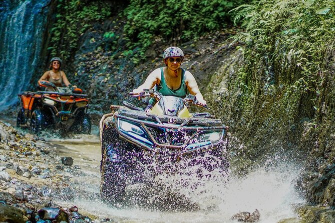 Bali Adventure ATV Quad Bike, Monkey Forest and Waterfalls - Riding Bali Adventure ATV quad bike: muddy trails and river crossings
