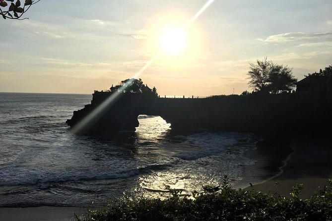 Bali Ancient Temples Tour - Tanah Lot sunset over the ocean, with the right strategy