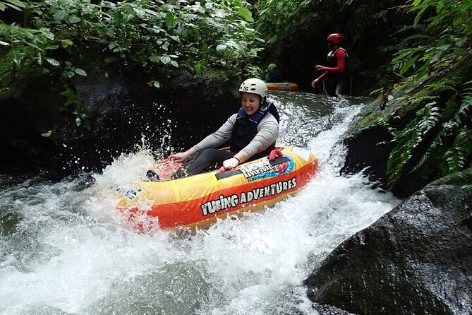 Bali Canyon Tubing Adventure - Down the stream: tubing in the hidden canyon with bridges and footpaths