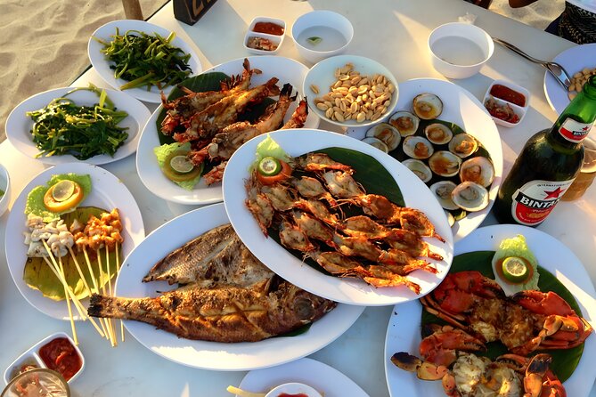 Bali Water Sports and Uluwatu Tour Packages - Stop 5: Jimbaran Beach Seafood Dinner with the Sunset Atmosphere