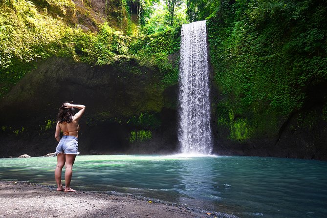 Best of Bali Waterfalls: Tibumana, Tukad Cepung and Tegenungan - Tibumana: jungle steps to a swim-in waterfall near Ubud
