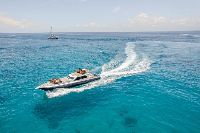 Full Day Nusa Penida by Honey Milk Yacht 13 meters - Snorkeling from calm lagoons to SD Point current drift