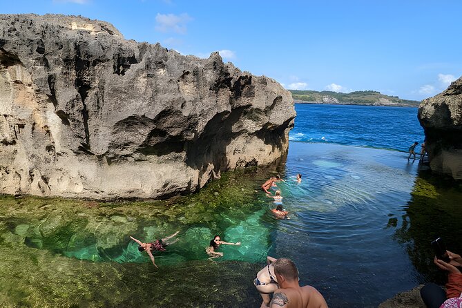 Full Day Nusa Penida Island Beach Tour From Bali - Stop 2: Pasih Uug (Broken Beach) and the arch-with-surf drama