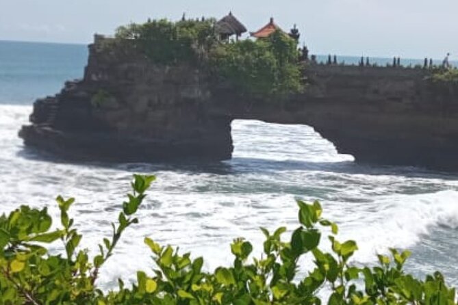 Half Day Tanah Lot Temple Private Guided Tour - Taman Ayun Temple: the royal water garden, fish pond, and peaceful morning feel