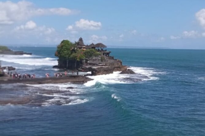 Half Day Tanah Lot Temple Private Guided Tour - Tanah Lot sunset: ocean cliff temple views, holy spring water, and weather reality