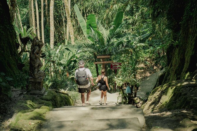 Half Day Ubud Waterfall Tour - Stop One: Rang Reng Cave Waterfall in Goa Rang Reng