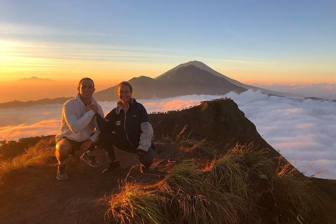 Mount Batur Sunrise Trekking with Breakfast - Getting gear at the trailhead, torches and trekking poles included