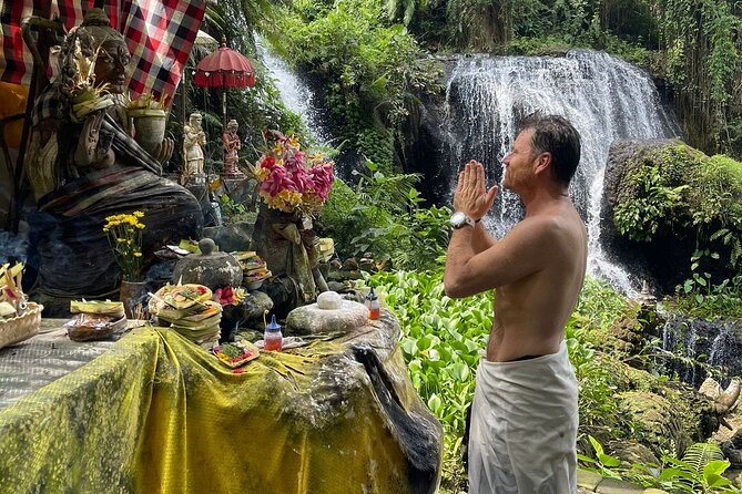 natural holy waterfalls healing tour. - Entering the Beji Griya Waterfall cleansing ritual