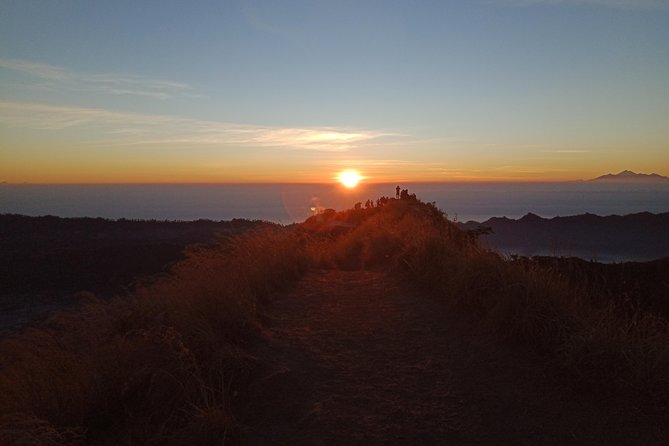 Private Mount Batur Sunset Trekking - All inclusive tour - Trek reality on Mount Batur: steep steps, helpful sticks, and guide safety