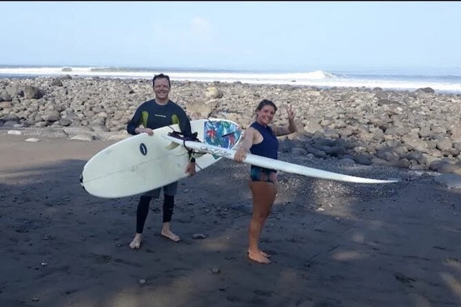 Private One on One Surf Lesson in Canggu area - Bali - Entering the waves at Batu Bolong Beach