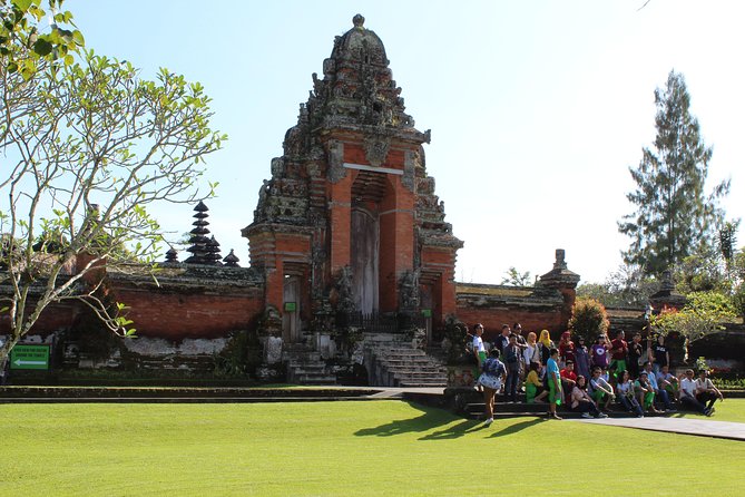 Private Tour: Bali Temples, Hidden Waterfall and Handara Gate - Ulun Danu Beratan: a lake temple view with mountains behind it