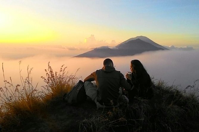 Private Tour Mount Batur Sunrise Trekking and Natural Hot Spring - Guide support and included gear that makes the trek less scary