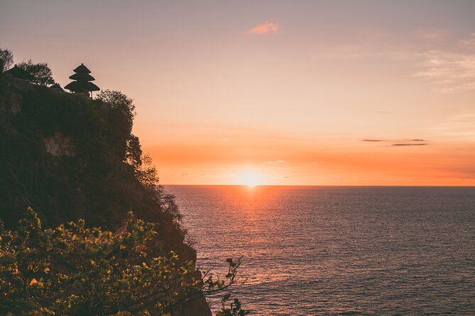 Private Uluwatu Sunset, Kecak Dance, Dinner at Jimbaran Beach - Entering Uluwatu Temple: ocean cliffs, sacred setting, and monkey rules