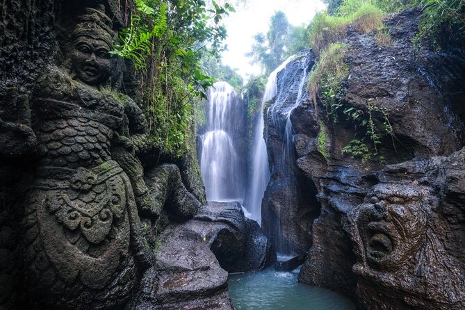 Purifications at Beji Griya Waterfalls - Final pool shower and the priest blessing with young coconuts