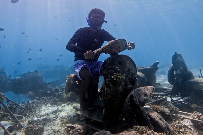 Snorkeling with turtle and statue in Gilis - Key Points Before You Go