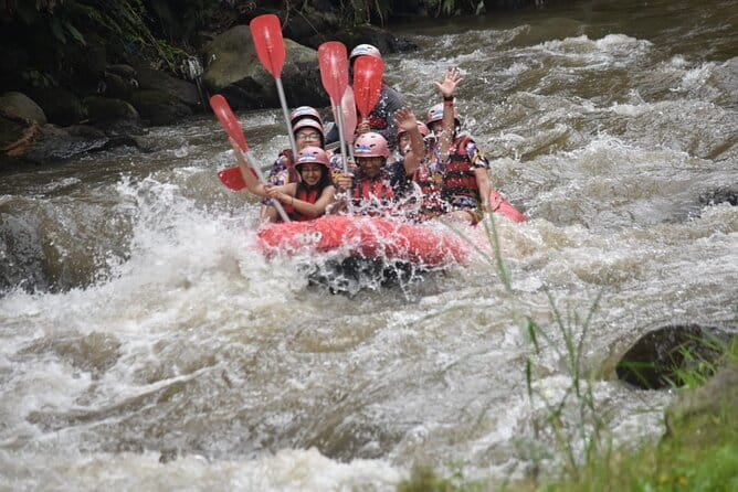 Ubud Ayung River Rafting with Meeting Point or Pickup - The 12-kilometer rafting ride: waterfalls, cliff carving, and real water fun