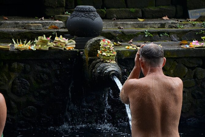 Ubud Full Day ATV Adventure with Rice Terrace and Temple Ritual - Tirta Empul Temple: sacred water and a ritual you can respect