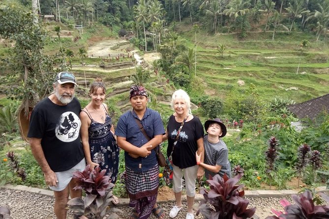 Ubud Hot Springs and Waterfall Private Guided Tour - Tirta Empul purification temple: a sacred stop, not just a photo stop