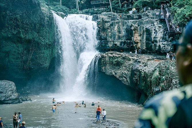 Ubud Tour with Jungle Swing and Waterfall Water Temple - Stop 5: Tegenungan Waterfall, stairs, cool mist, and that closer-to-real feeling
