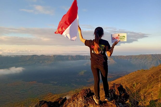 Watch the sunrise from the top of Mount Batur volcano - Summit Waiting for Sunrise, First Light, and Those Big Bali Views